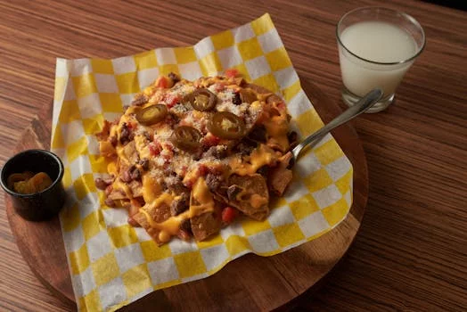 loaded nachos cheese jalapeños sour cream