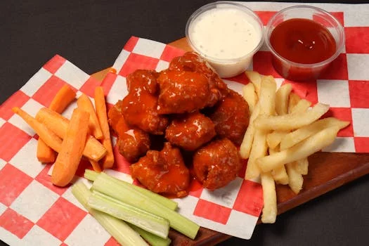 buffalo wings with celery sticks blue cheese